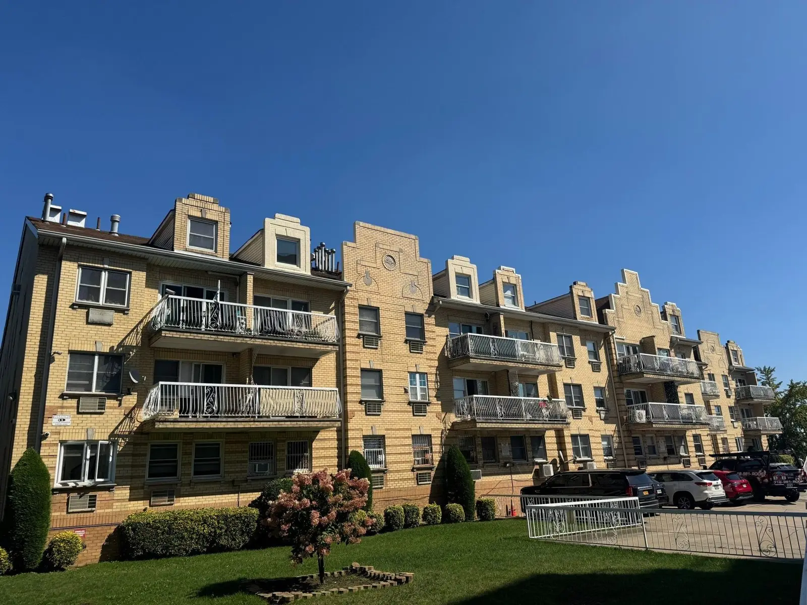 Four-story multifamily condo building in Staten Island with balconies