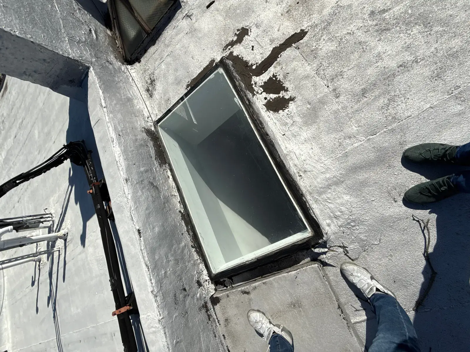Before: Flat roof & skylight in St. George