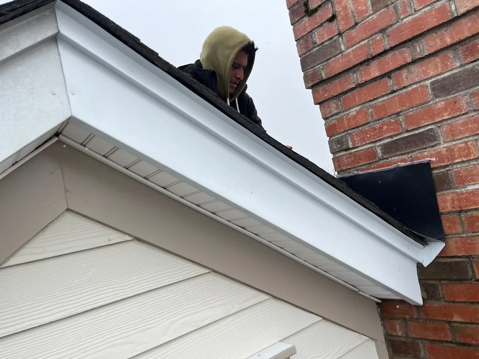 New fascia wrapped in white aluminum with new drip edge at the same house