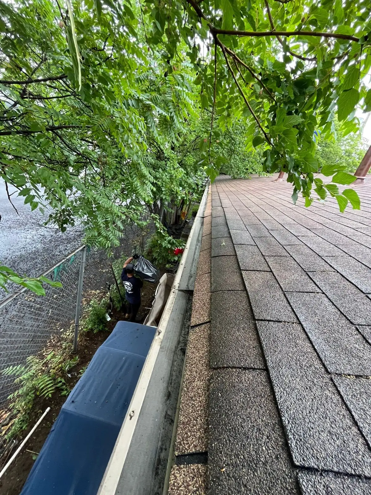 Long run of gutter along a house roof edge